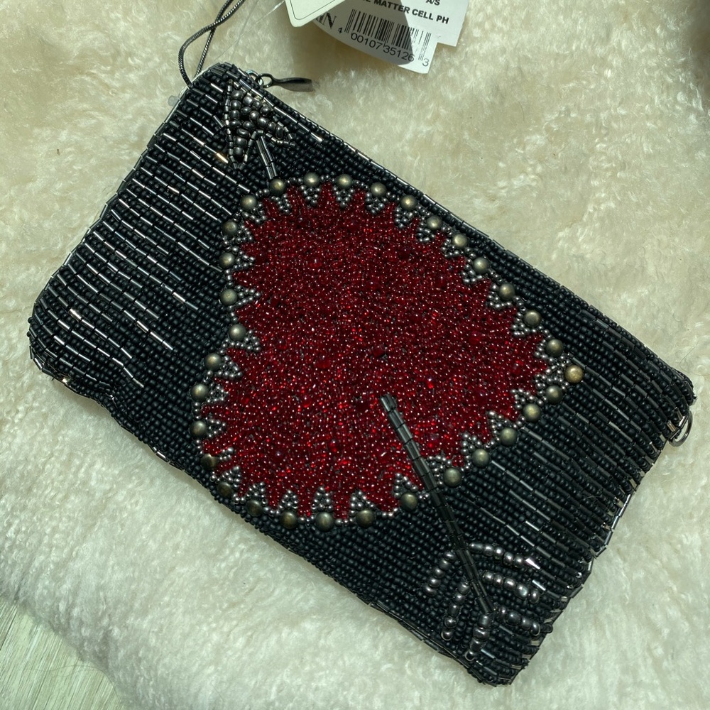Mary Frances heart clutch
